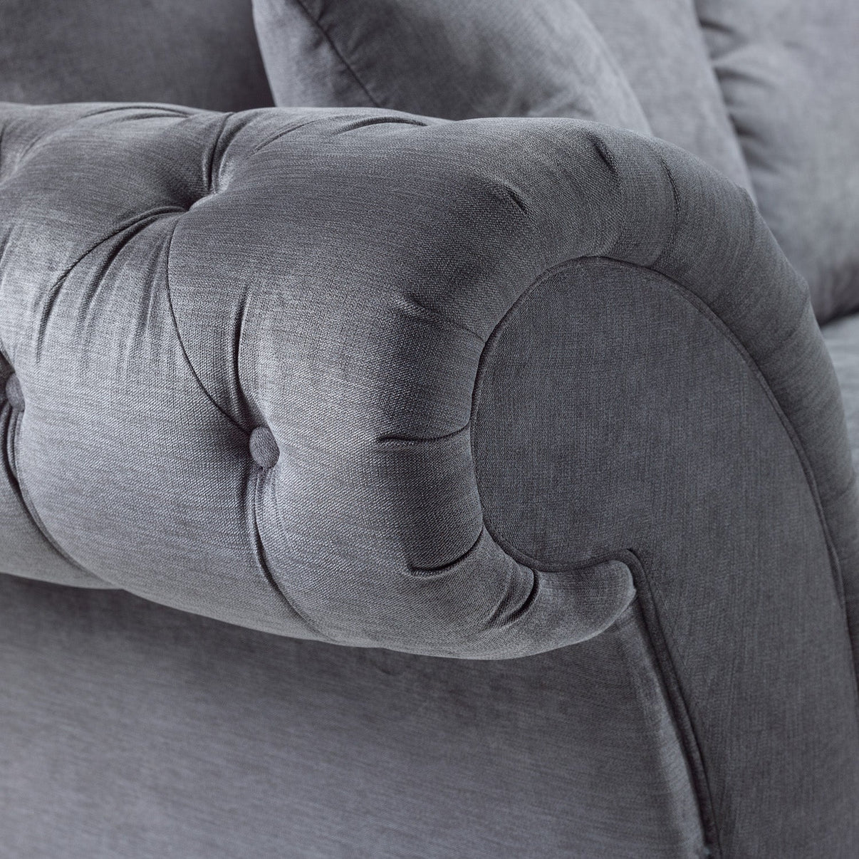 Button-Tufted Scroll Arms
