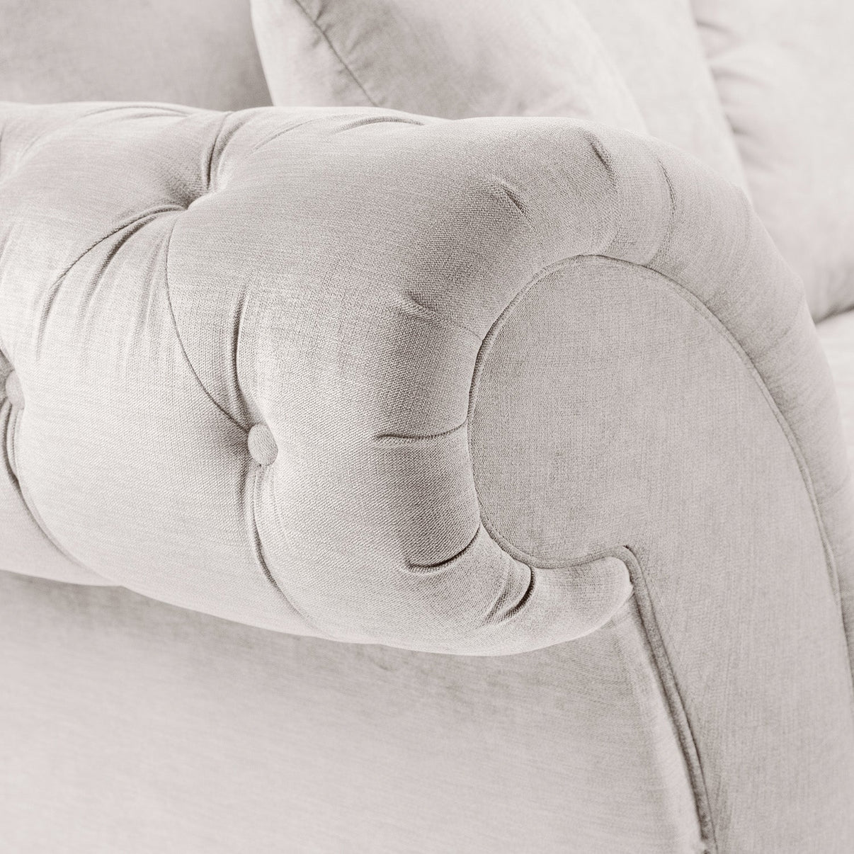 Button-Tufted Scroll Arms